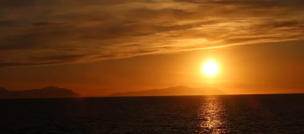 Yellow sun near the horizon.