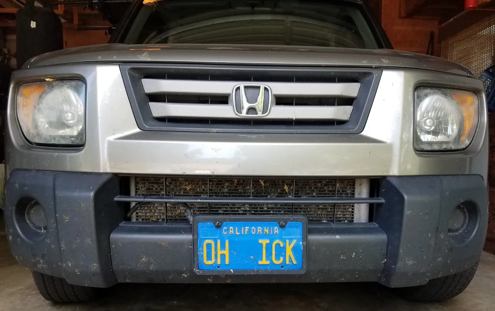 License Plate that says Oh Ick