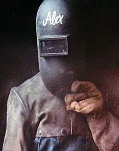 Jennifer Beale in Alex's welding mask