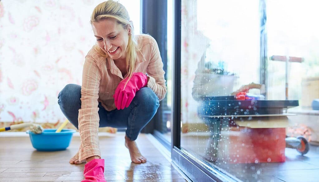 Woman working on Spring cleaning projects.