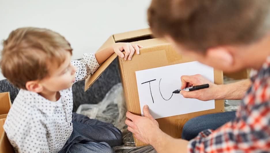 A father and son getting organized for a move.