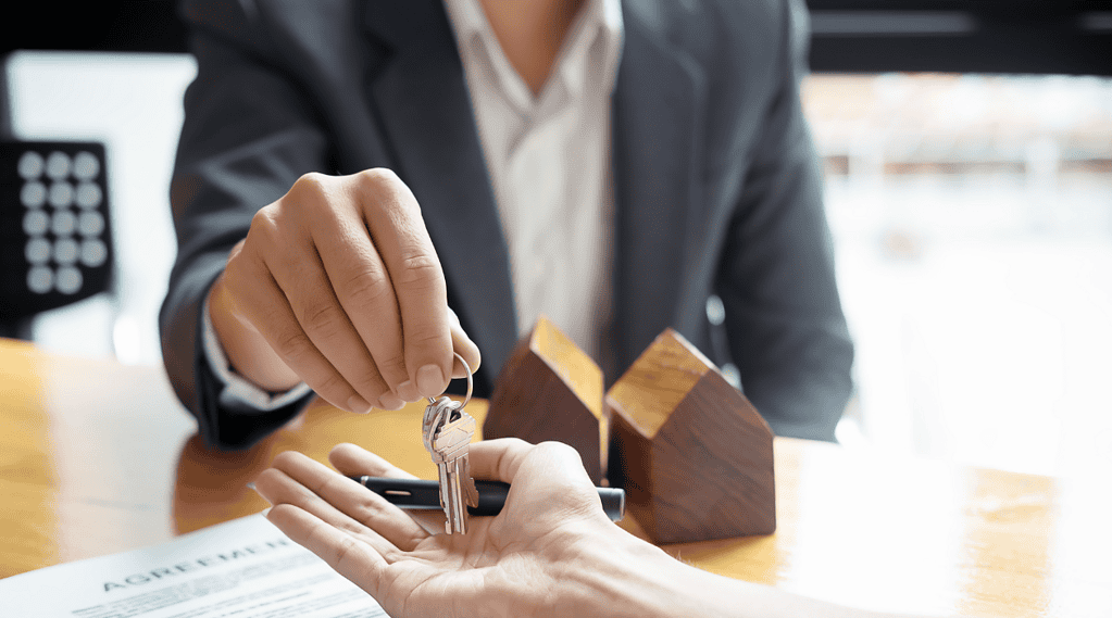real estate closing handing over keys