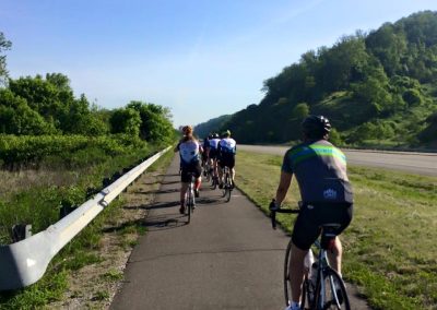 Cyclists enjoying a scenic trail ride along the Ohio Valley Trail.