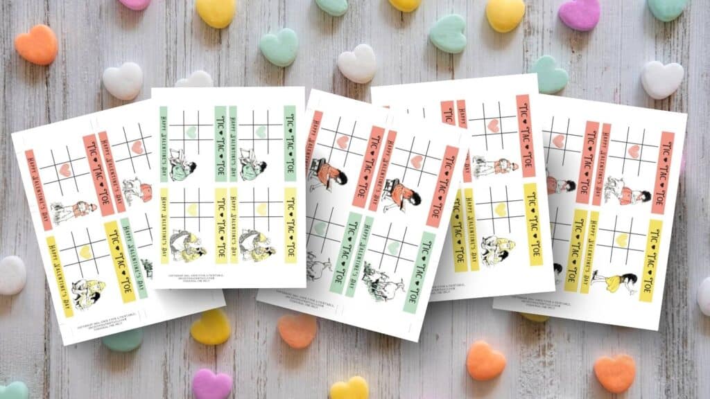 Heidi illustrated by Jessie Willcox Smith Valentine's Day Tic tac toe cards on a conversation hearts background.