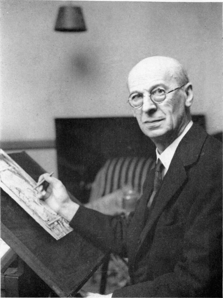 Children's book illustrator, Arthur Rackham at his work table drawing.
