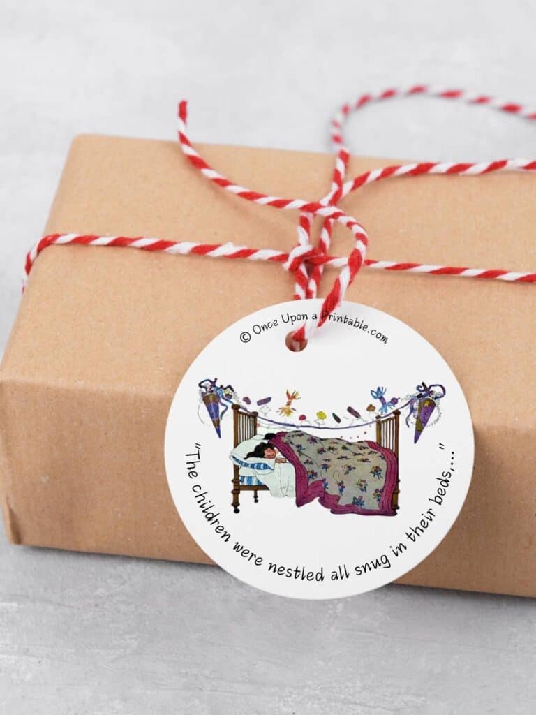 Simple vintage Christmas gift tags on brown paper wrapped boxes and red ribbon, adorned with a vintage illustration by Jessie Willcox Smith's version of Twas the night before Christmas story.