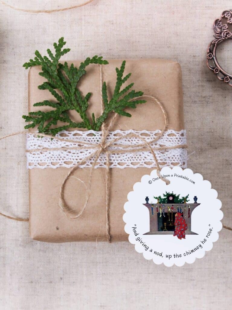 Simple vintage Christmas gift tags on brown paper wrapped boxes and red ribbon, adorned with a vintage illustration by Jessie Willcox Smith's version of Twas the night before Christmas story.