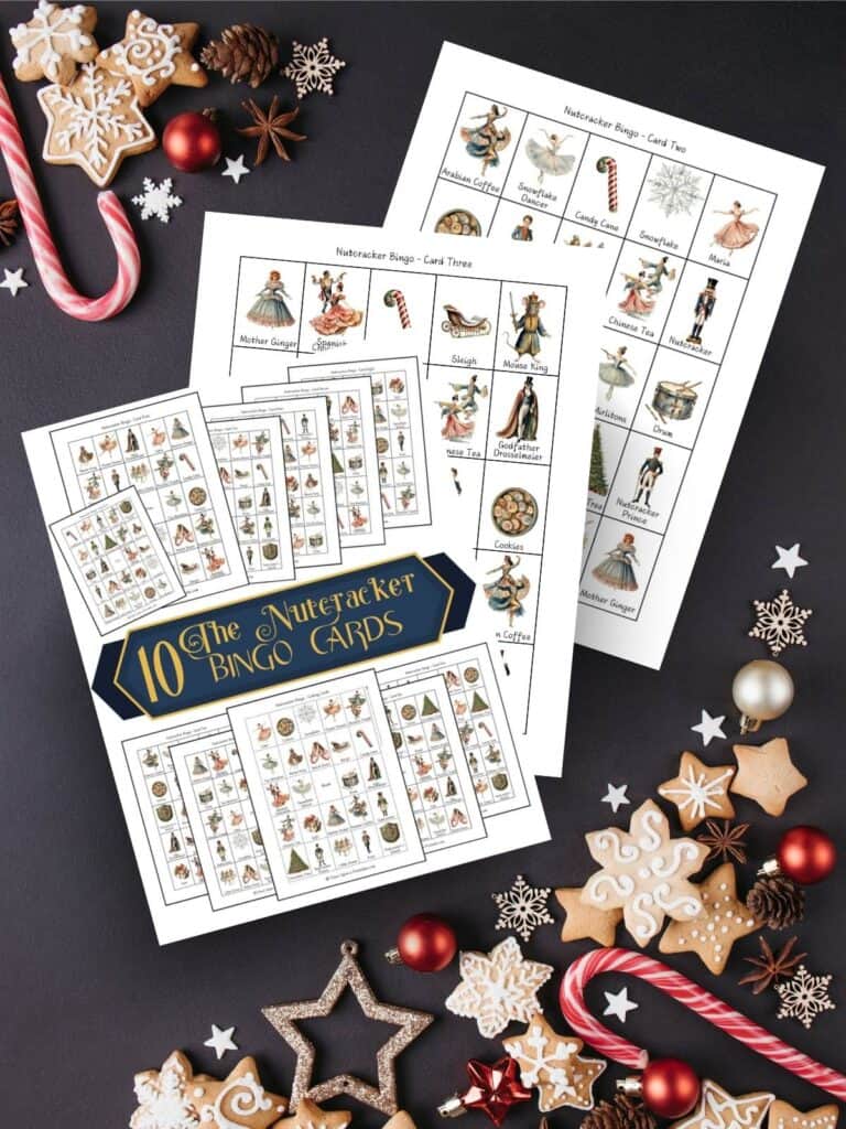 Nutcracker themed bingo cards on a dark background with christmas candy and cookies.