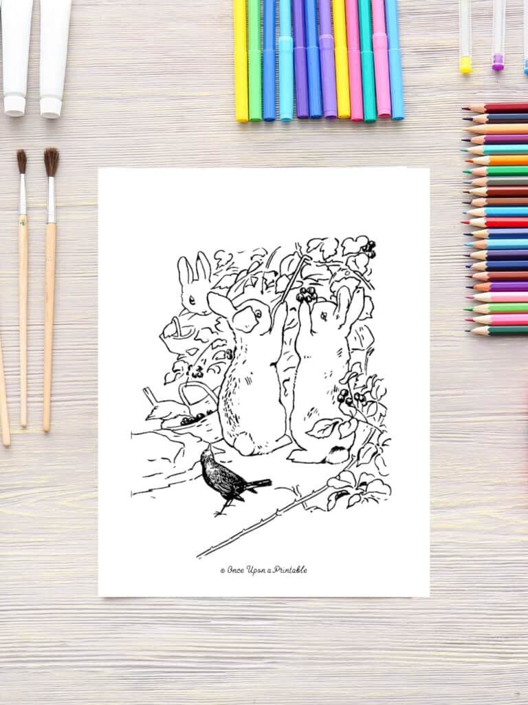 Flopsy, Mopsy, and Cottontail picking blackberries at the patch coloring page on a table with coloring pencils.