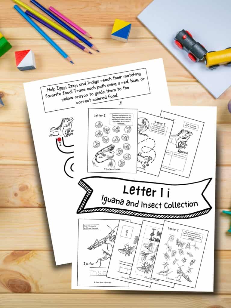 Letter I unit study worksheets with iguana and insects laying on a wooden table.