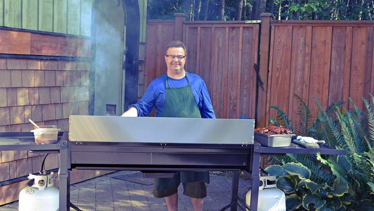 Orchard Recovery Center chef Gord Hedge cooking steaks for the alumni