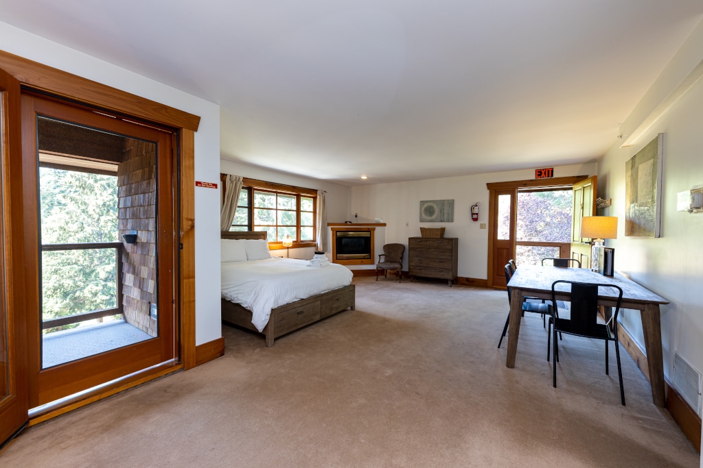 Large bedroom with two queen size and fireplace