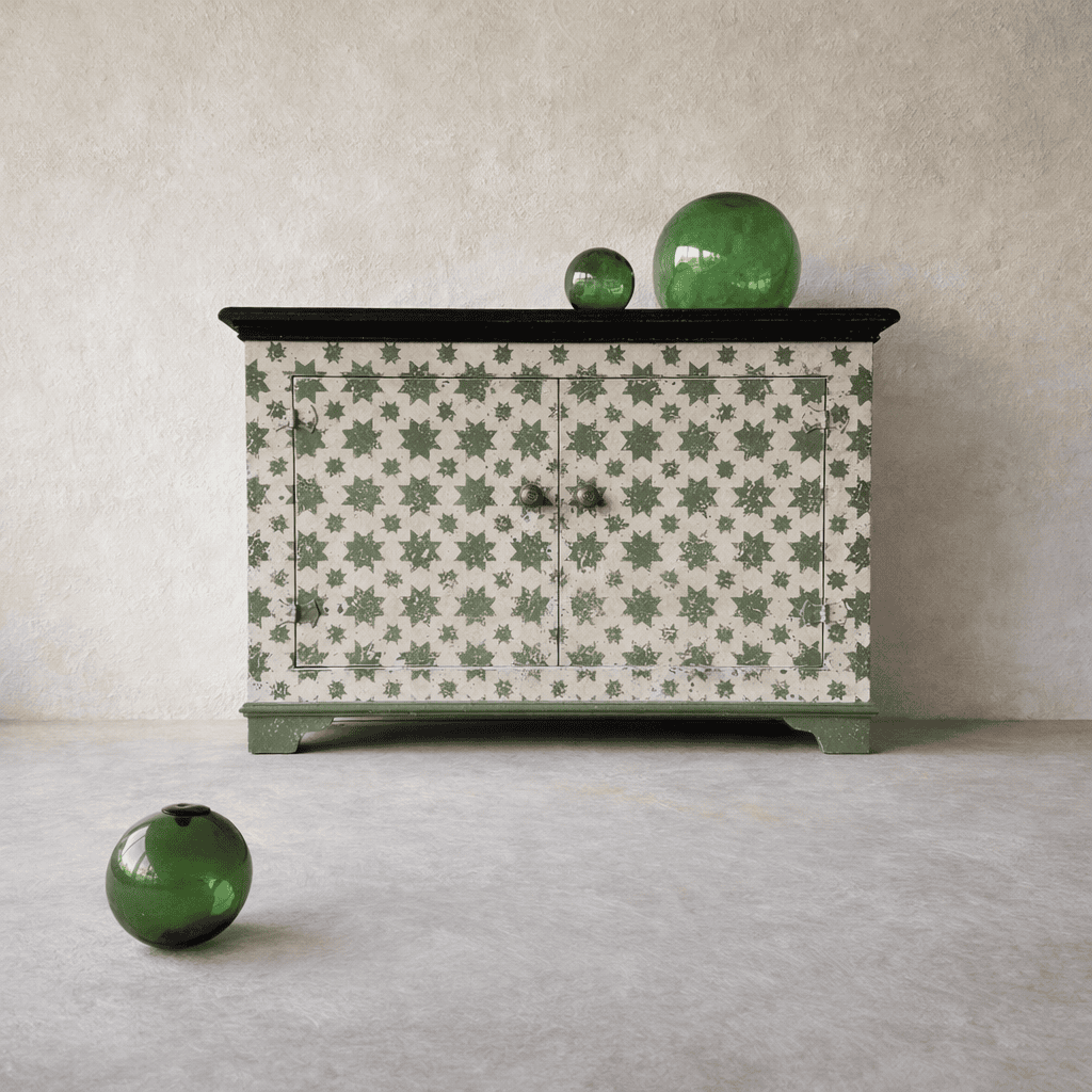 Front view of green star Italian decorative painted pattern on bespoke sideboard