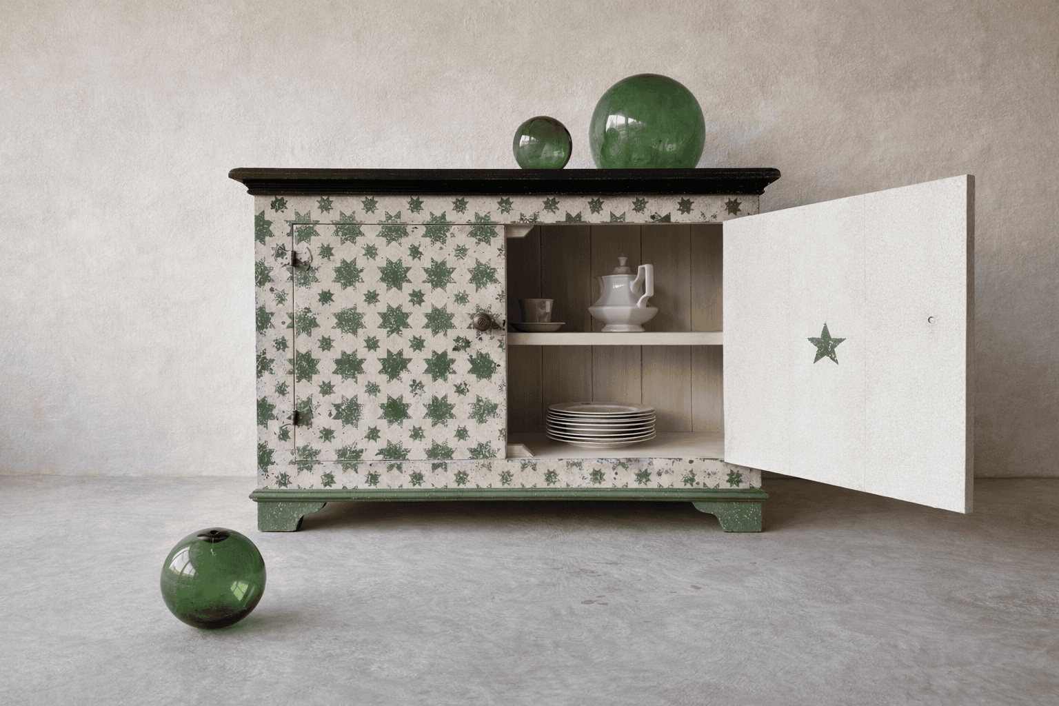 Open view of Calke Green Stars bespoke painted sideboard with Italian decorative pattern