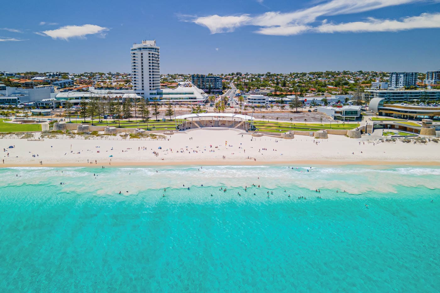 View of Scarborough Beach, Perth. Turquoise blue waters, white sandy beach and the iconic Rendezvous Hotel