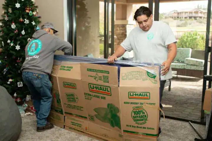 Overall Moving performing loading and unloading services