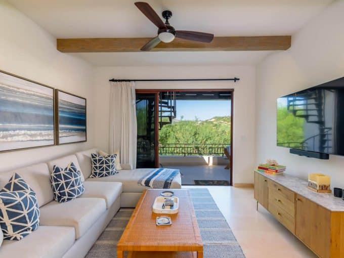 A Living Room With A Couch And A Television