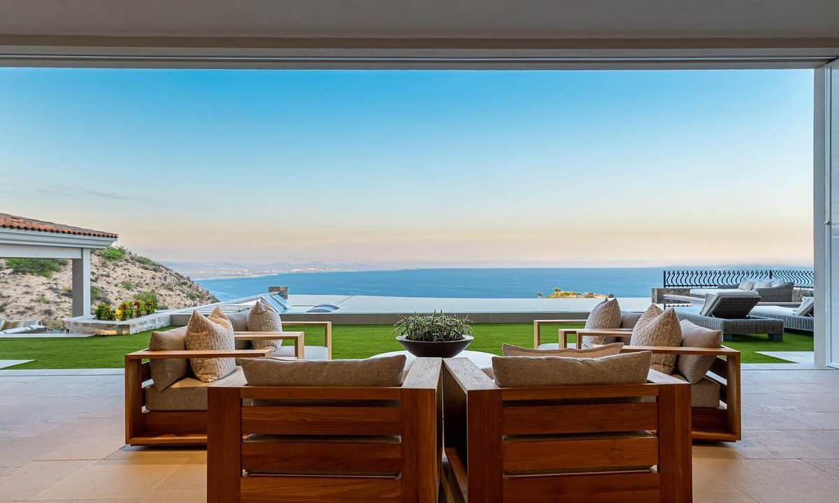 Outdoor Seating Area At La Montaña 7 In Villas Del Mar, Palmilla, Featuring Infinity Pool, Modern Lounge Chairs, And Panoramic Views Of The Sea Of Cortez In Los Cabos.