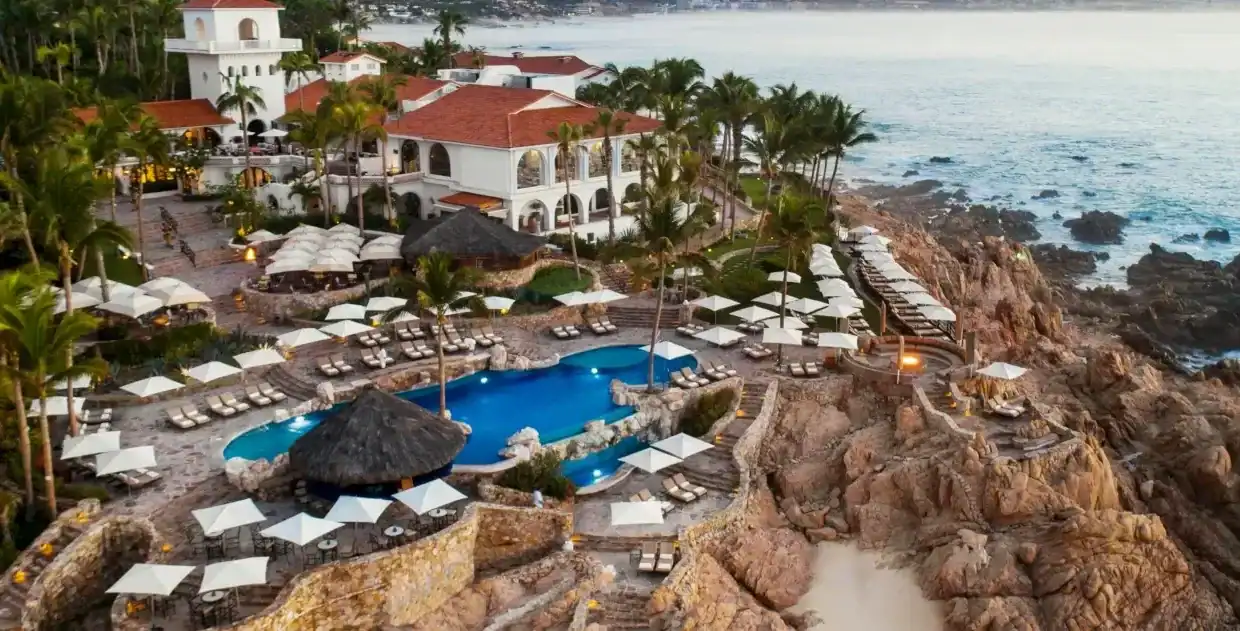 Aerial View Of One&Amp;Only Palmilla Los Cabos Resort Pool Built Into The Cliffs Overlooking The Ocean.