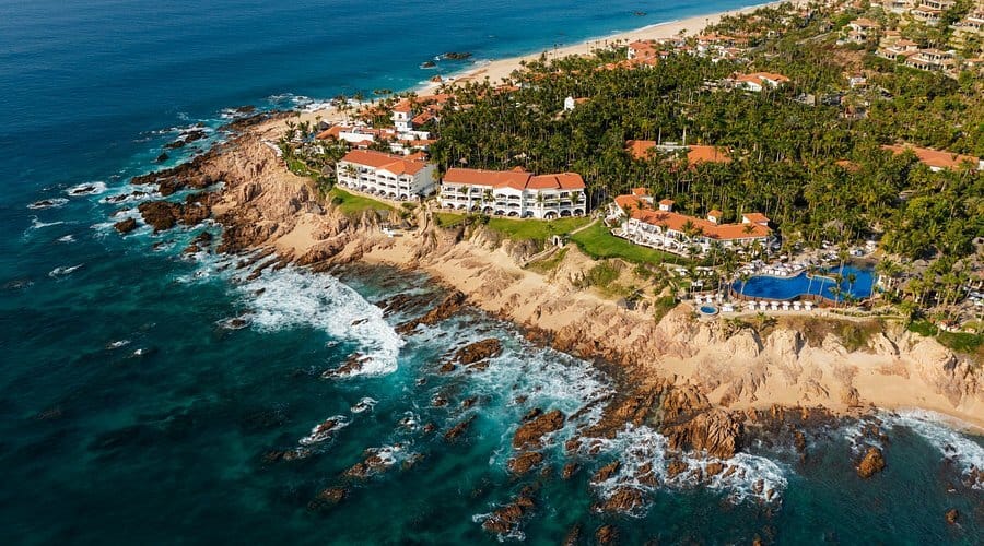 Aerial View Of One&Amp;Only Palmilla Los Cabos Resort With Beachfront Villas And Lush Landscaping.