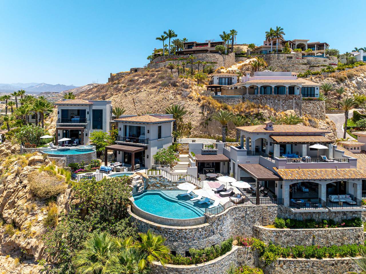 Luxurious Palmilla Hillside Estate With Multiple Pools, Modern Architecture, And Stunning Ocean Views In A Gated Community. Perfect For Upscale Living And Investing In Exclusive Real Estate.