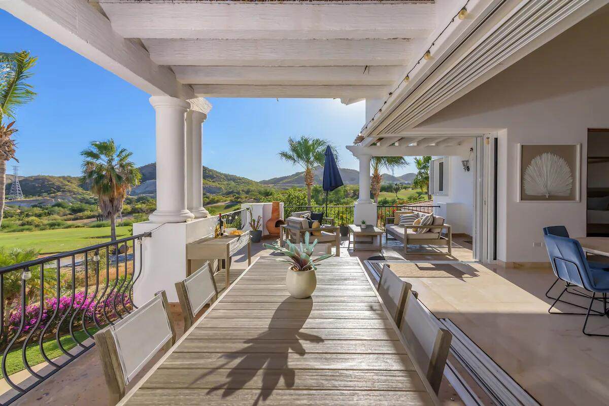 Bright Outdoor Palmilla Terrace With Scenic Mountain Views, Comfortable Seating, And Lush Greenery, Perfect For Relaxing Or Entertaining Guests In A Luxurious Setting.