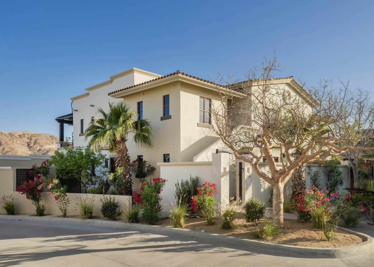 Luxurious Palmilla Estate With Lush Landscaping And A Scenic Mountain Backdrop, Featuring A Modern Mediterranean Design Perfect For Elegant Living In Palmilla.