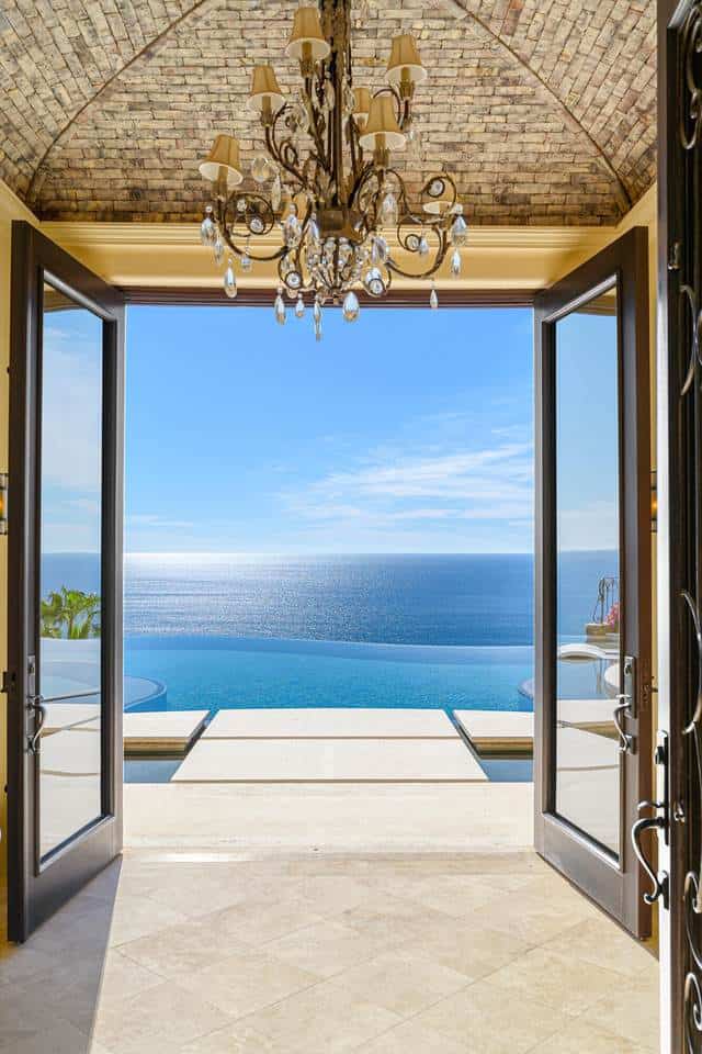 Palmilla Ocean View From Luxurious Villa With Infinity Pool And Elegant Chandelier.