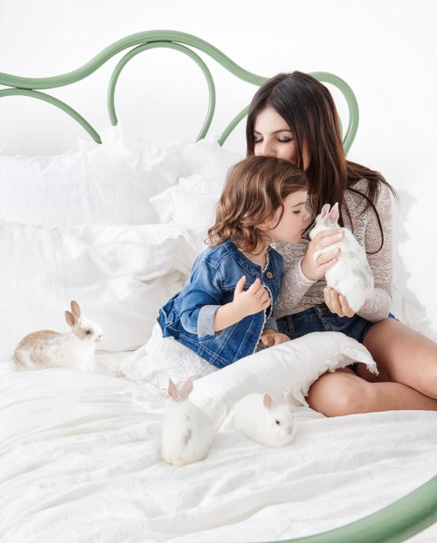 Rabbit lovers, mother and daughter with rabbits in a cozy home setting, natural lifestyle photography, pet photography by Pamela Hanson.