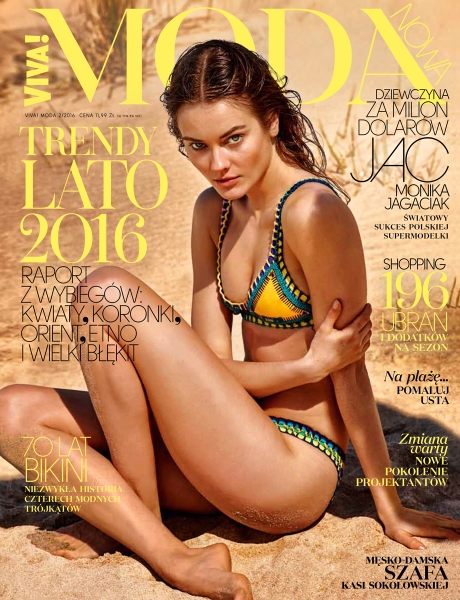 Bikini-clad woman sitting on beach sand, summer fashion, swimwear photography, modeling on beach, fashion magazine photoshoot, Pamela Hanson Photography.