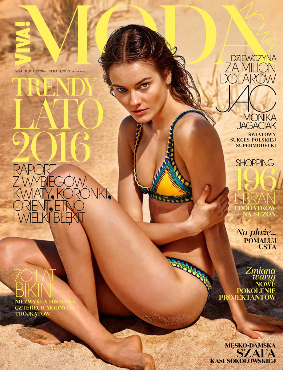 Bikini-clad woman sitting on beach sand, summer fashion, swimwear photography, modeling on beach, fashion magazine photoshoot, Pamela Hanson Photography.