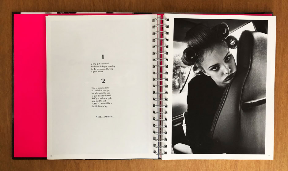 Portrait of a young woman with hair rollers sitting in a car, black and white image capturing a candid, stylish moment with emphasis on fashion, beauty, and editorial photography.
