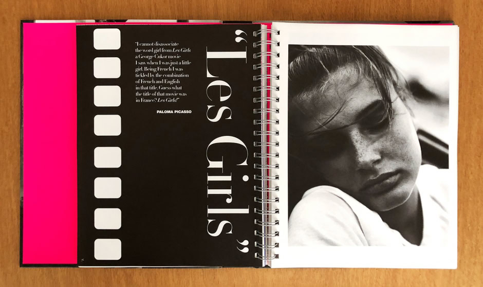 Vivid black and white portrait of a young girl with freckles and tousled hair, captured with artistic photography techniques, emphasizing natural beauty and emotional expression.