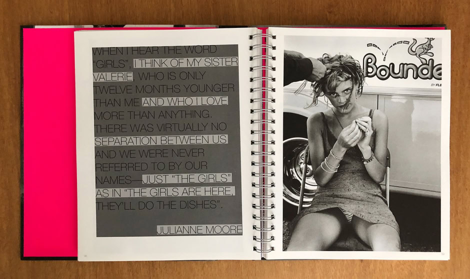 A black-and-white portrait of a young woman sitting outdoors, wearing a dress and bracelets, with messy hair, in a candid portrait style from Pamela Hanson Photography.