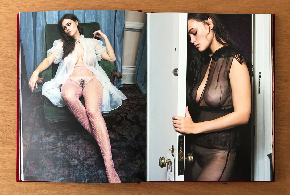 Elegant brunette model in sheer lingerie and fishnet stockings lounging on vintage green armchair, capturing sensuality in classic boudoir photography.