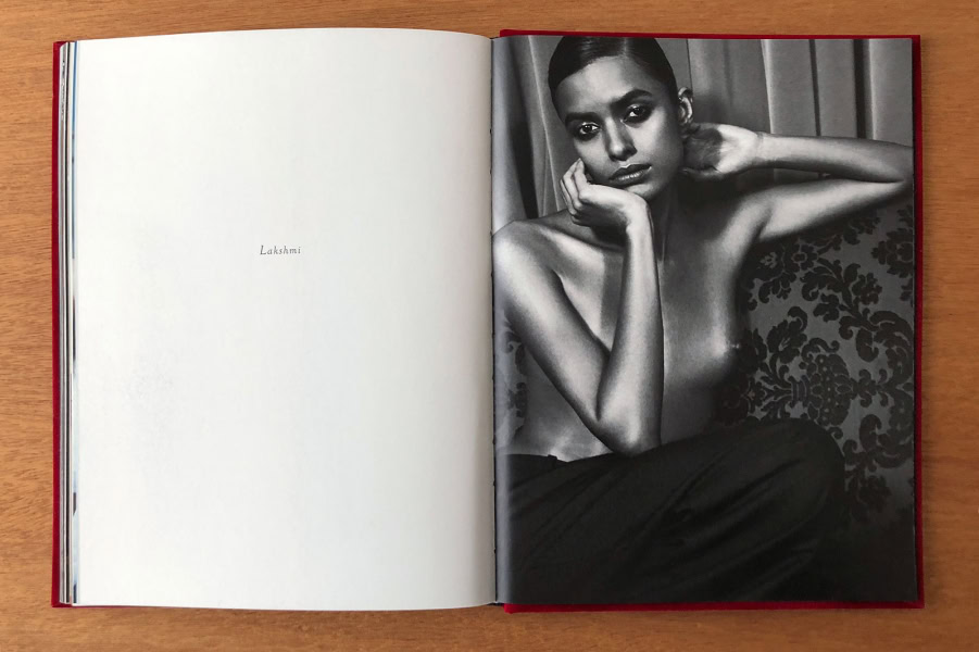 Elegant black and white portrait of a woman with short hair, striking facial expression, and minimalist styling, showcasing Pamela Hanson's artistic fashion photography expertise.