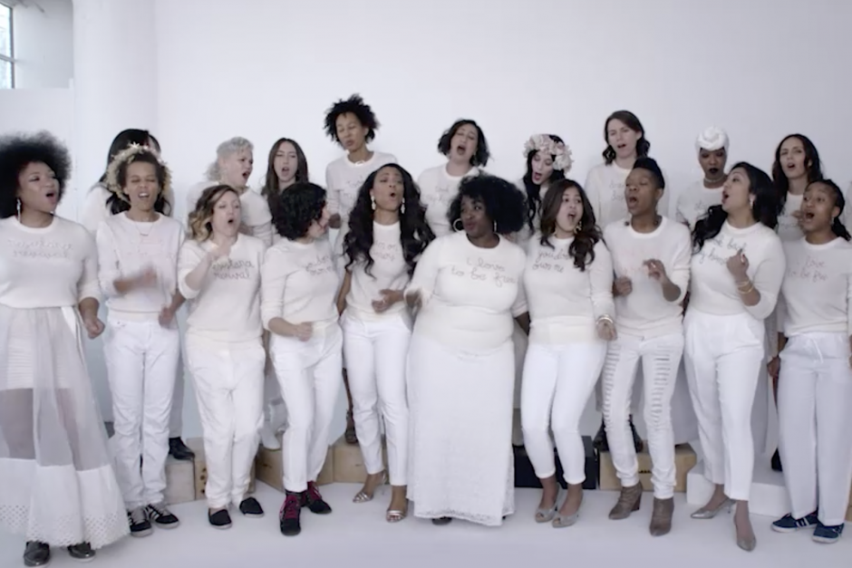 Black women choir singing passionately in white attire, diverse group, professional photography by Pamela Hanson, capturing powerful expressions and unity, high-quality portrait for black culture and music promotion.