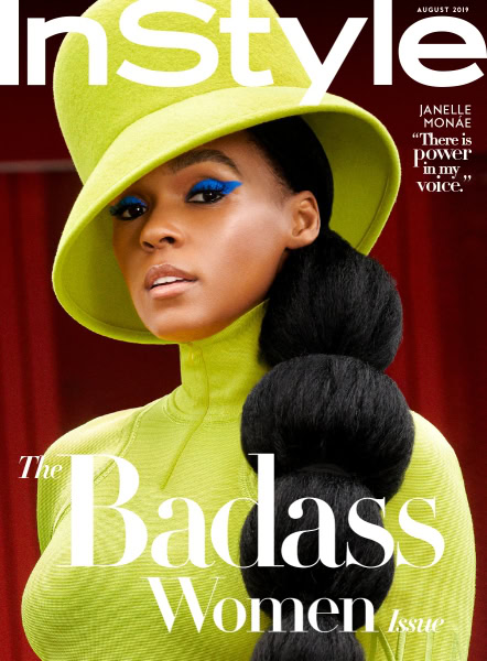 Stylish woman wearing bold blue makeup and a Lime green outfit with a matching hat, on the cover of InStyle magazine August 2019.