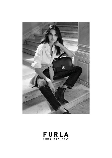 Furla fashion accessories, luxury handbags, and stylish footwear captured in a black and white fashion photograph by Pamela Hanson.