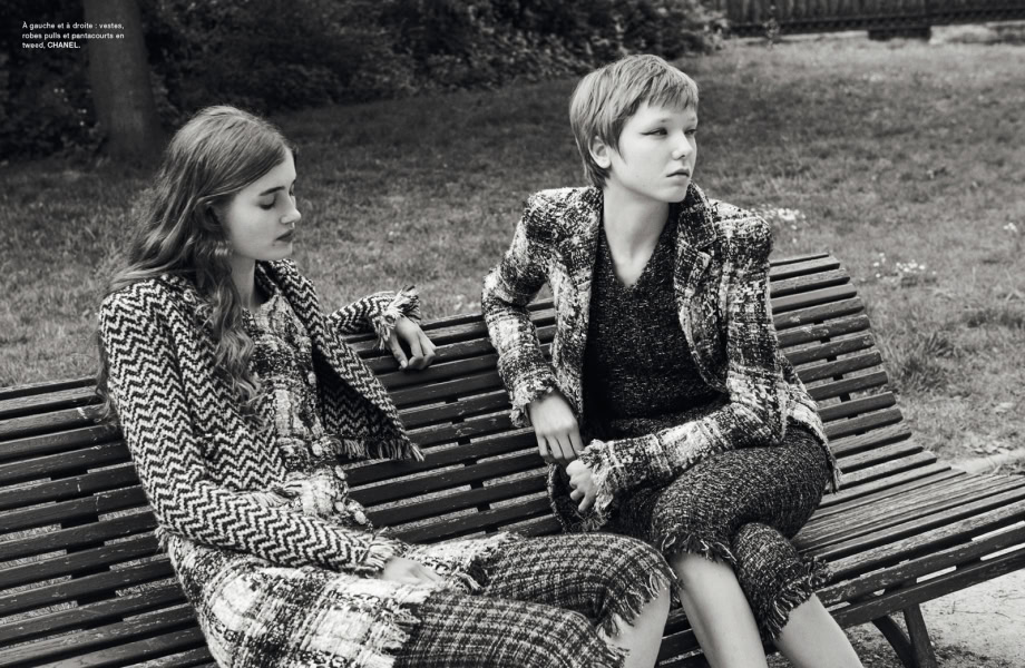 Elegant black and white portrait of fashionable young women sitting on a park bench, showcasing chic tweed outfits and sophisticated style, captured by Pamela Hanson Photography.