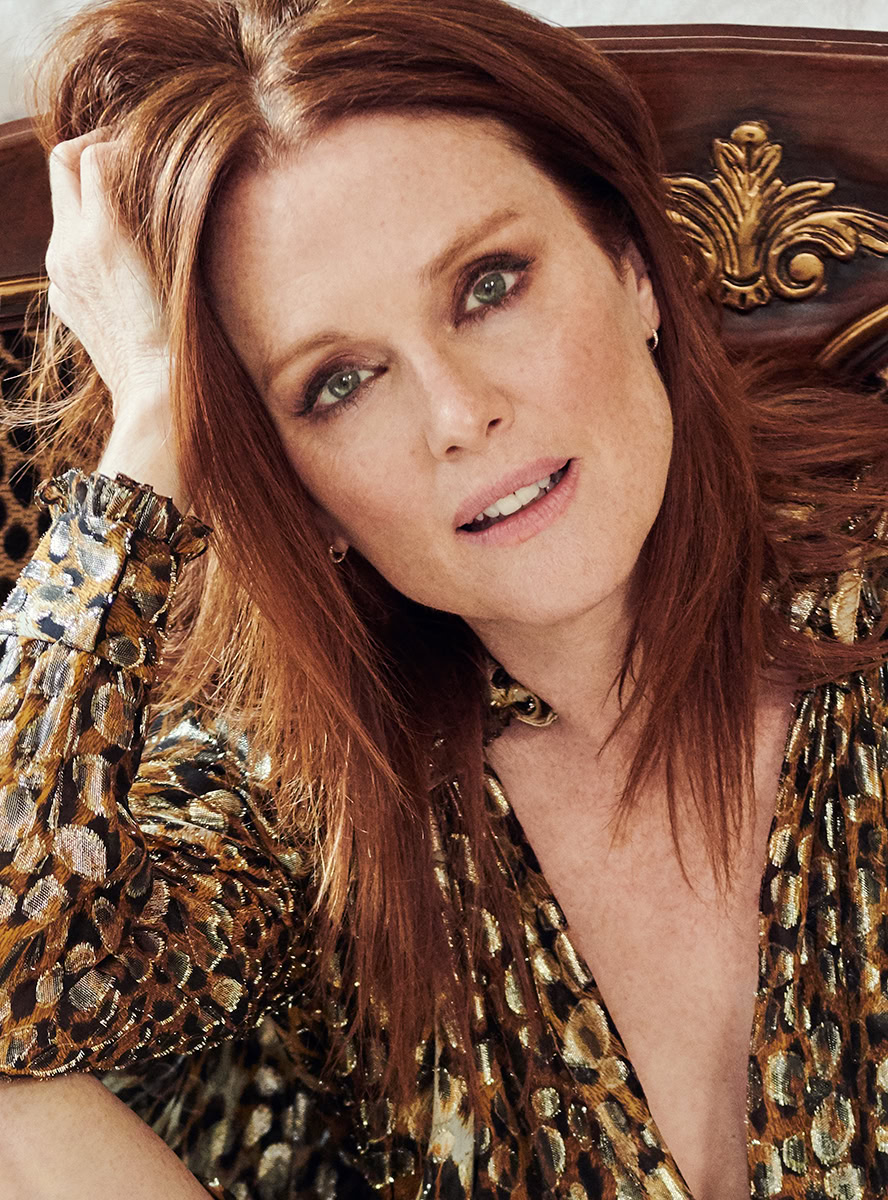 Elegant red-haired woman in leopard print dress, outdoor portrait, high fashion photography, Pamela Hanson style.