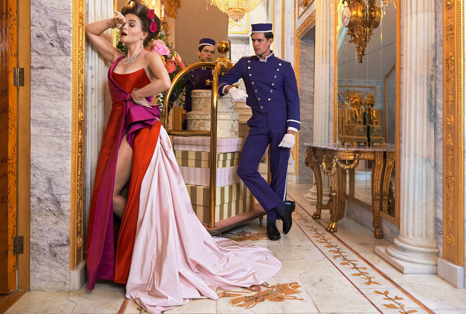 Luxurious haute couture gown modeling | Elegant fashion photography in opulent hotel lobby setting.