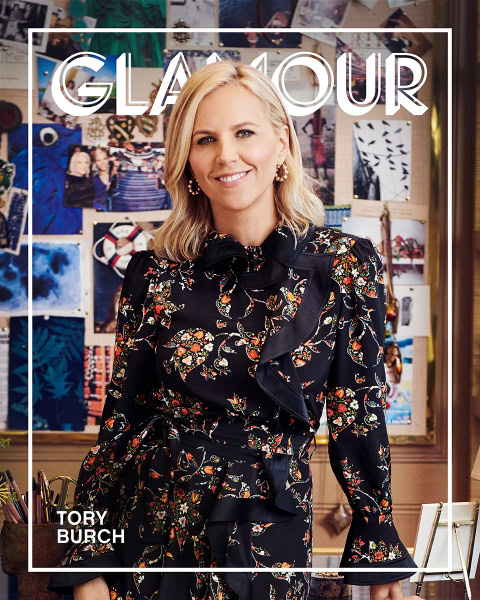 Elegant fashion portrait of Tory Burch in a stylish floral dress, captured by Pamela Hanson Photography, showcasing vibrant patterns and sophisticated style.