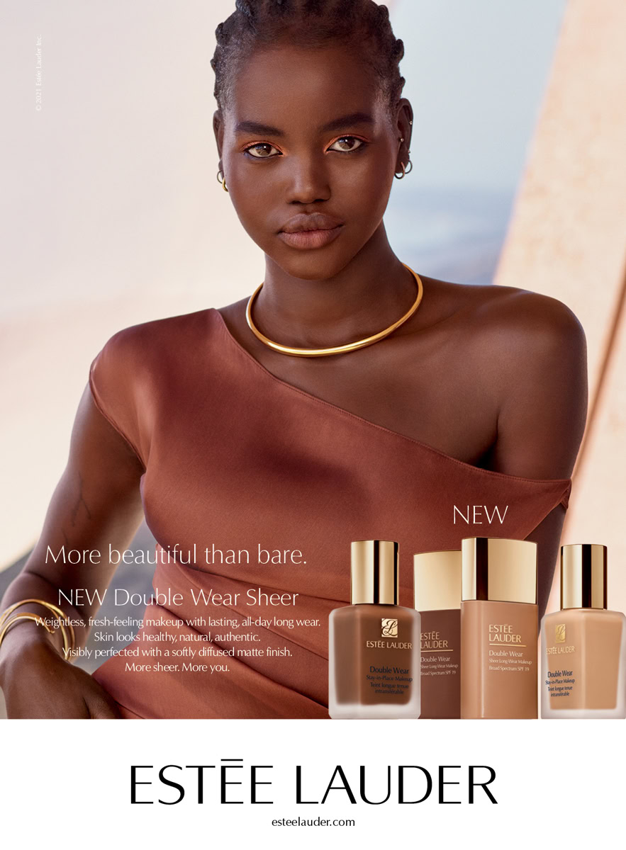 Elegant portrait of a confident African American woman modeling Estée Lauder Double Wear Sheer foundation, highlighting luxury skincare and makeup photography by Pamela Hanson.