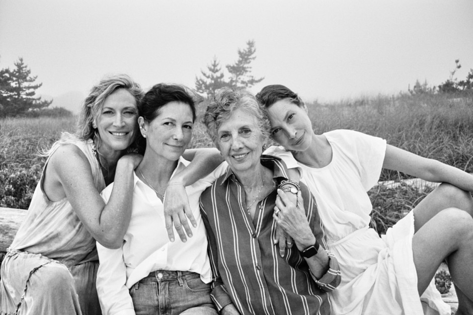 Beautiful black and white family portrait of four women outdoors, capturing candid moments of companionship and joy, shot by Pamela Hanson Photography.