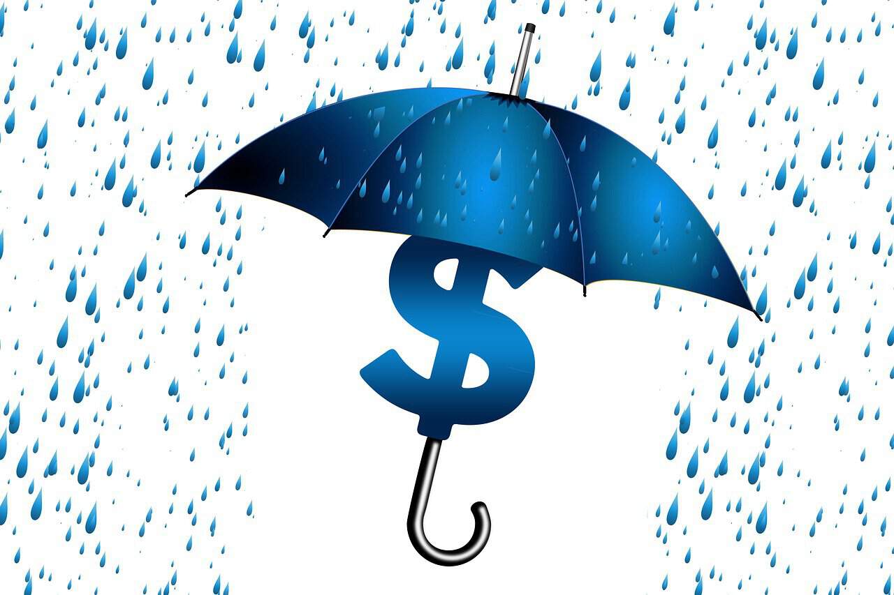 blue umbrella, blue money sign and rain drops