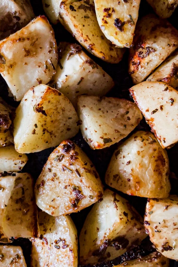 Potato chunks rubbed in a Balsamic Rosemary paste to serve Roasted with Pork Tenderloin. They are crunchy on the outside and soft in the center, a success always. | Paula's Apron Recipe