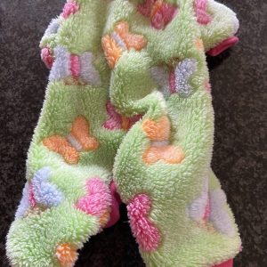 Colorful plush dog sweater with pastel heart patterns, soft fleece material, pink trim, perfect for fashionable and cozy canine winter wear. Ideal for small to medium dogs, combining comfort and style.