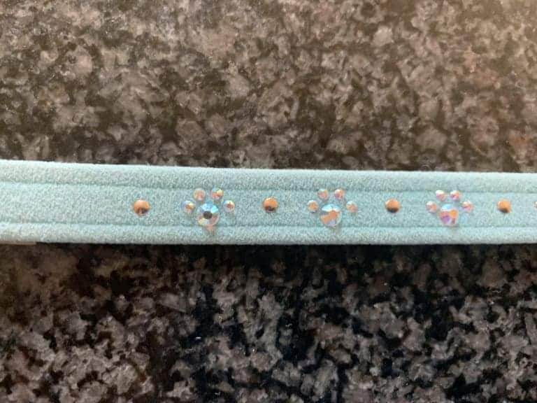 Shimmering light blue dog collar with rhinestone embellishments, perfect for small to medium pets, stylish and comfortable for everyday wear.