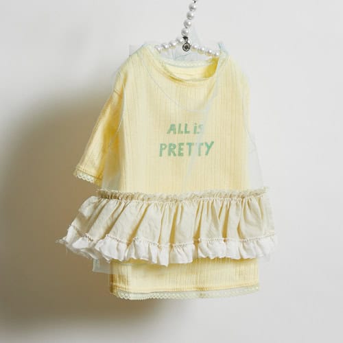 Lemon Smoothie Tee by Louisdog made from lightweight 100% cotton eyelet fabric for stylish everyday comfort.